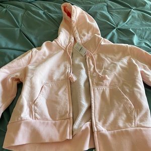 Pink hoodie with pockets one size from PacSun brand new with tags